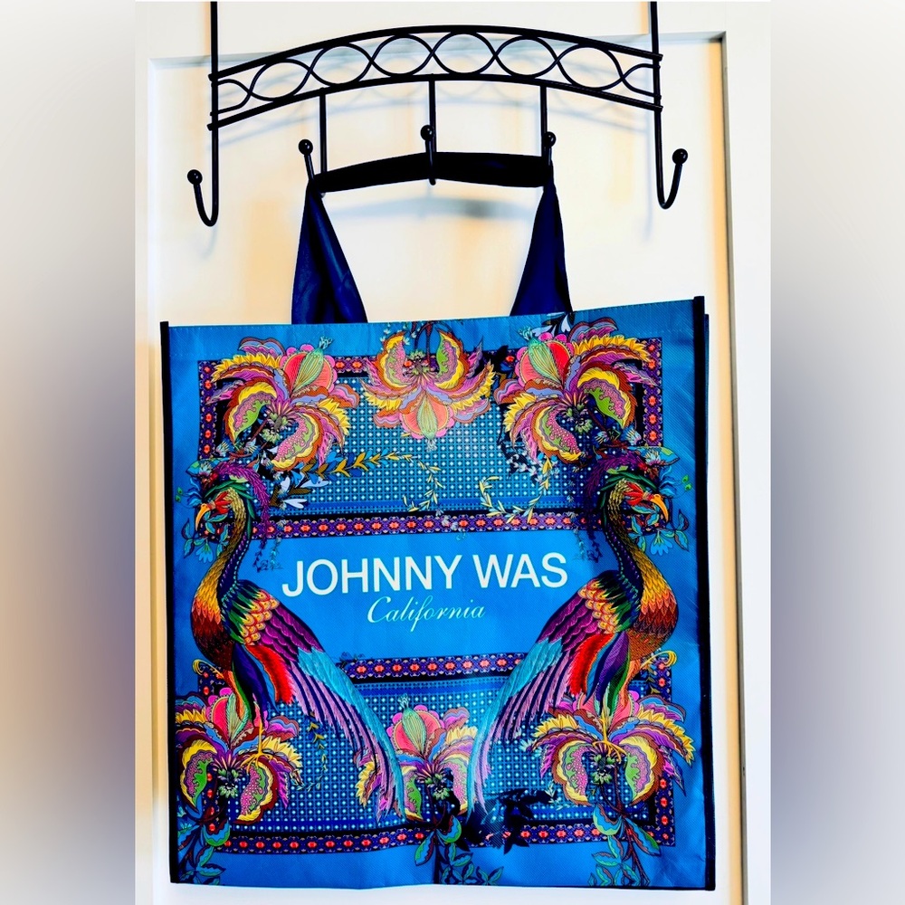 Phoenix bird and floral print on a bright teal blue background with "JOHNNY WAS